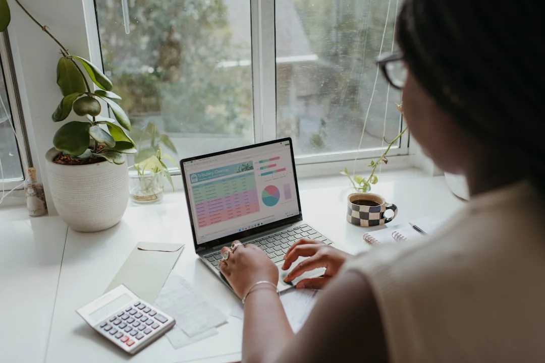 A UK business owner at a kitchen table checking whether they need to file a Self Assessment tax return