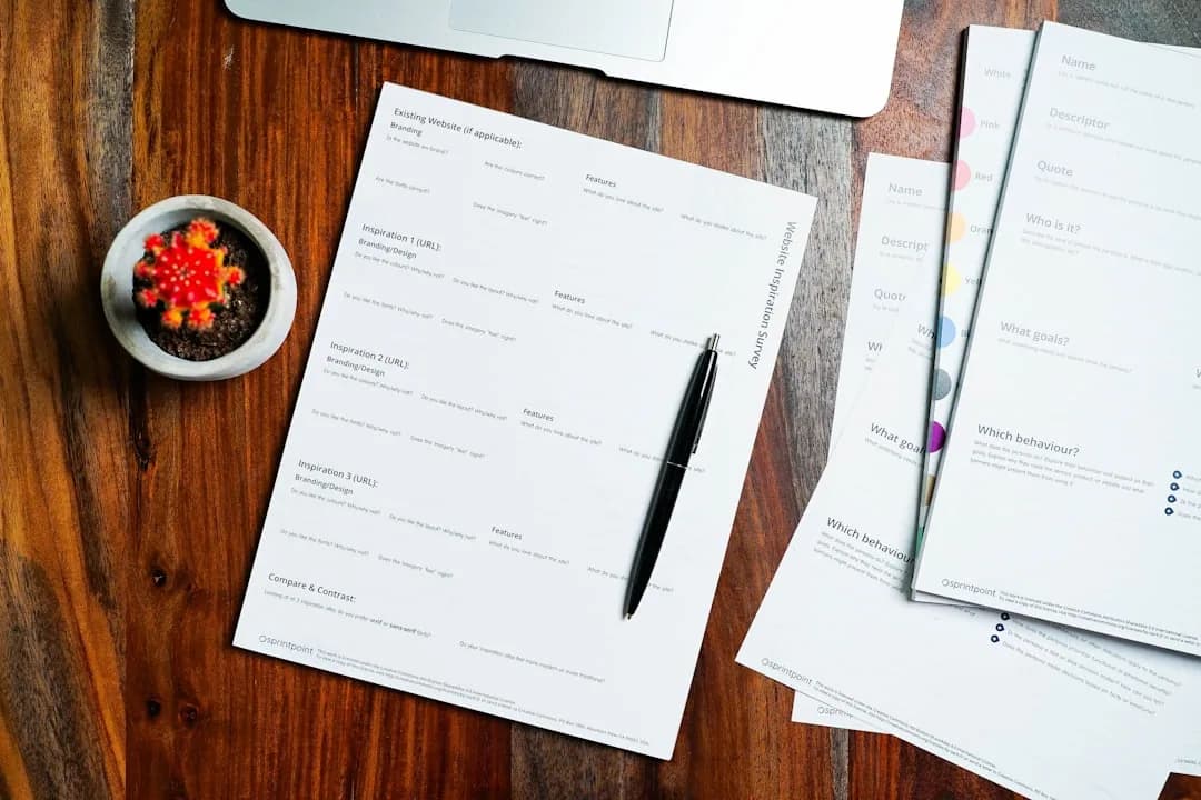 A UK business owner at a laptop completing an online VAT registration application