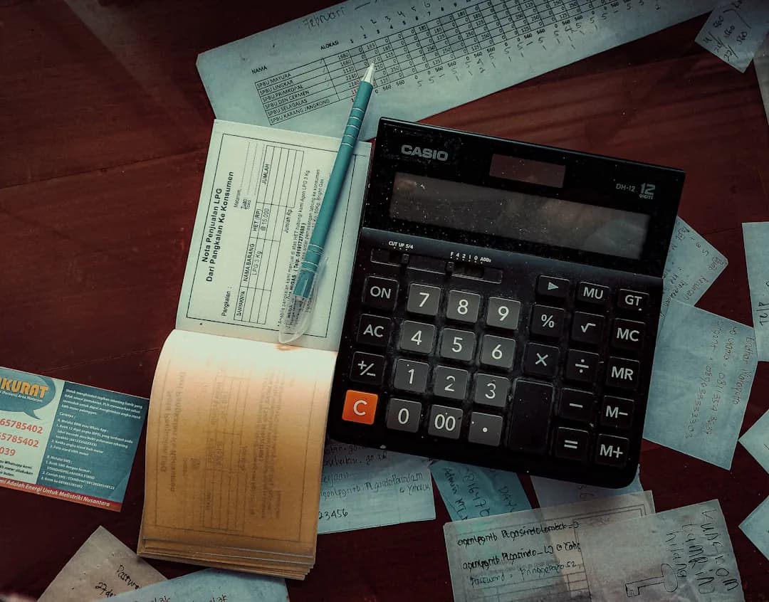 Self-employed person reviewing SA302 tax calculation documents for a mortgage application