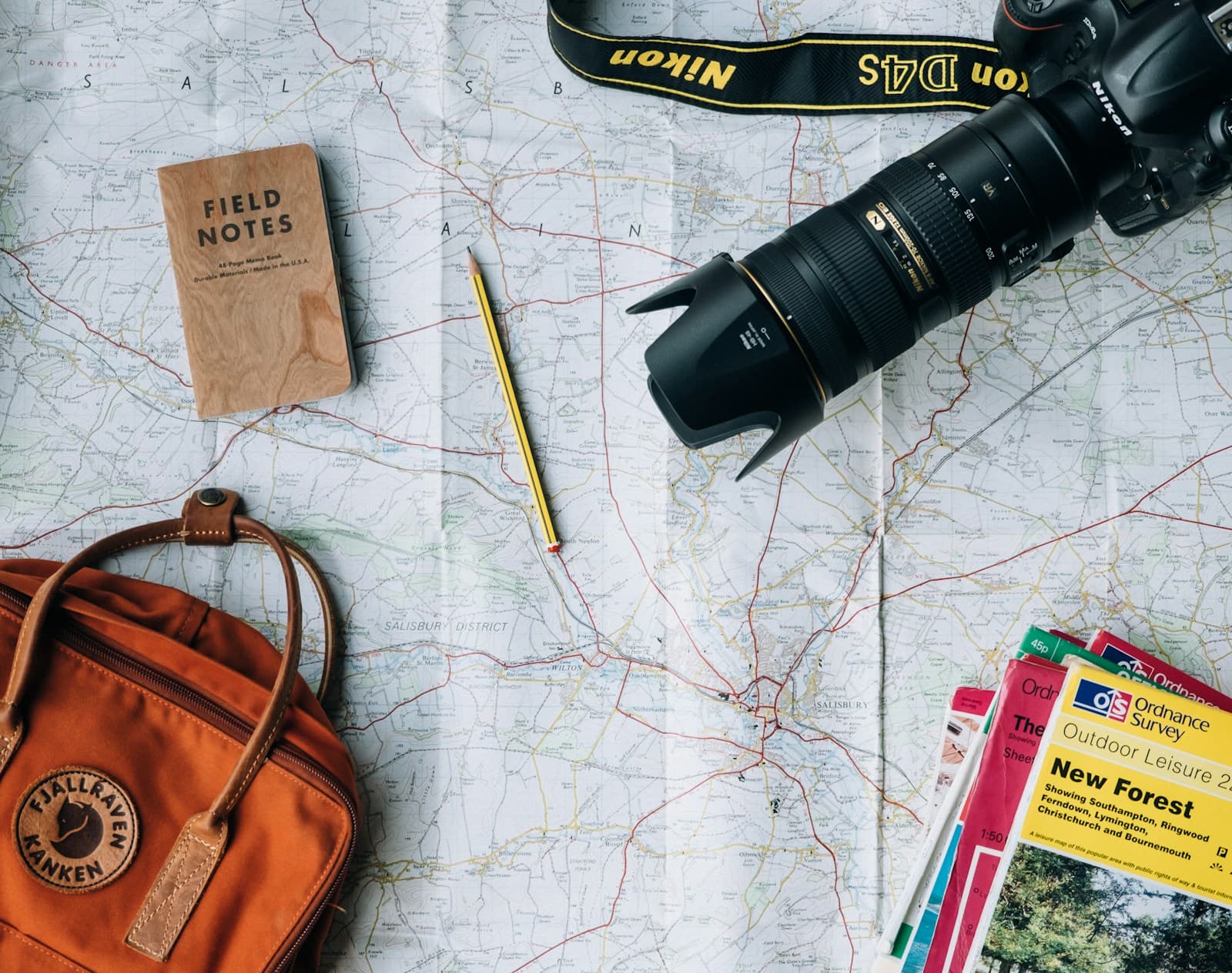 Travel desk with map and passport