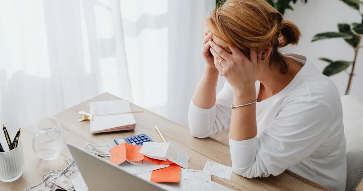Small business owner reviewing allowable expenses for tax savings.