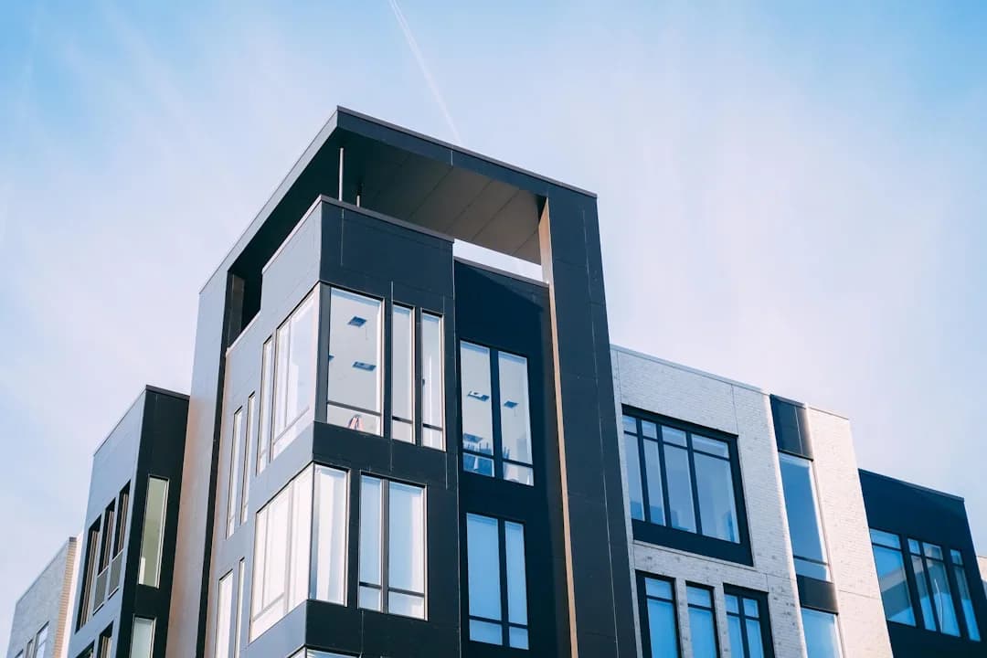 UK landlord at a desk reviewing buy-to-let mortgage and SPV company paperwork