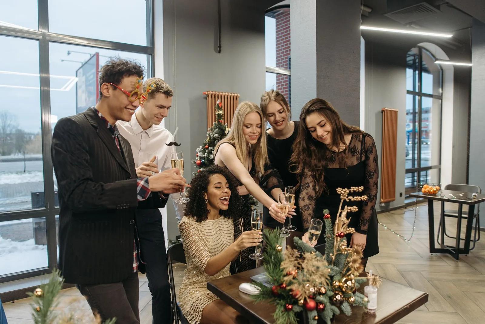 Office Christmas party with employees and guests dining at a festive venue in the UK