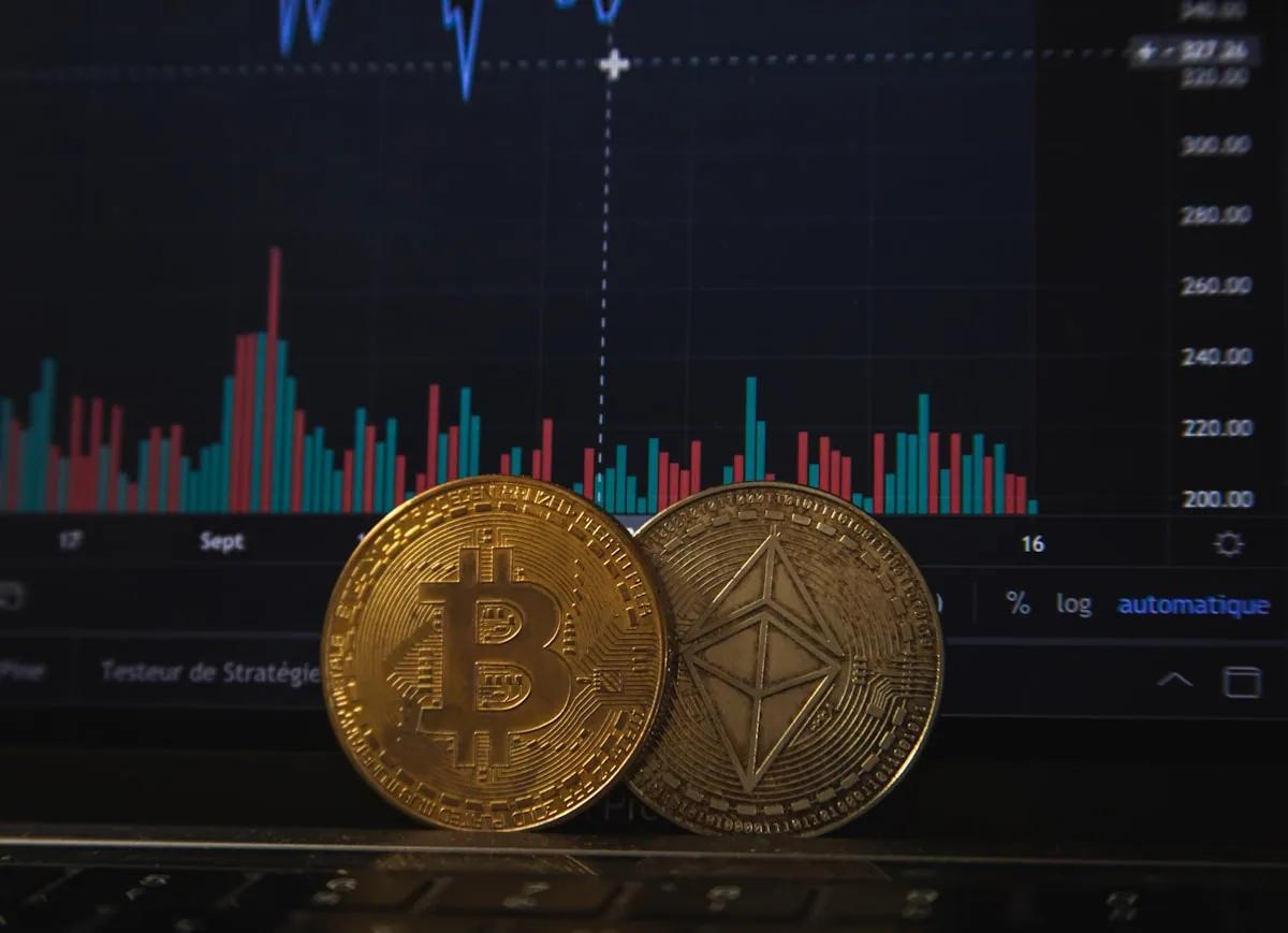 A UK investor reviewing cryptoasset transactions on a laptop to work out their tax