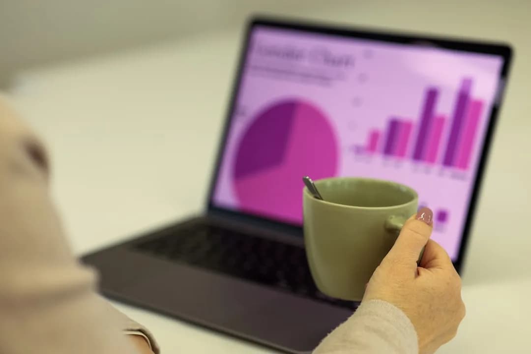 An eBay seller counting boxed stock at a desk while preparing sole trader year end accounts