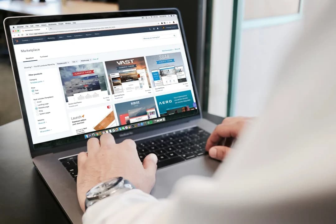 A UK online seller reviewing ecommerce KPIs and monthly management accounts on a laptop dashboard