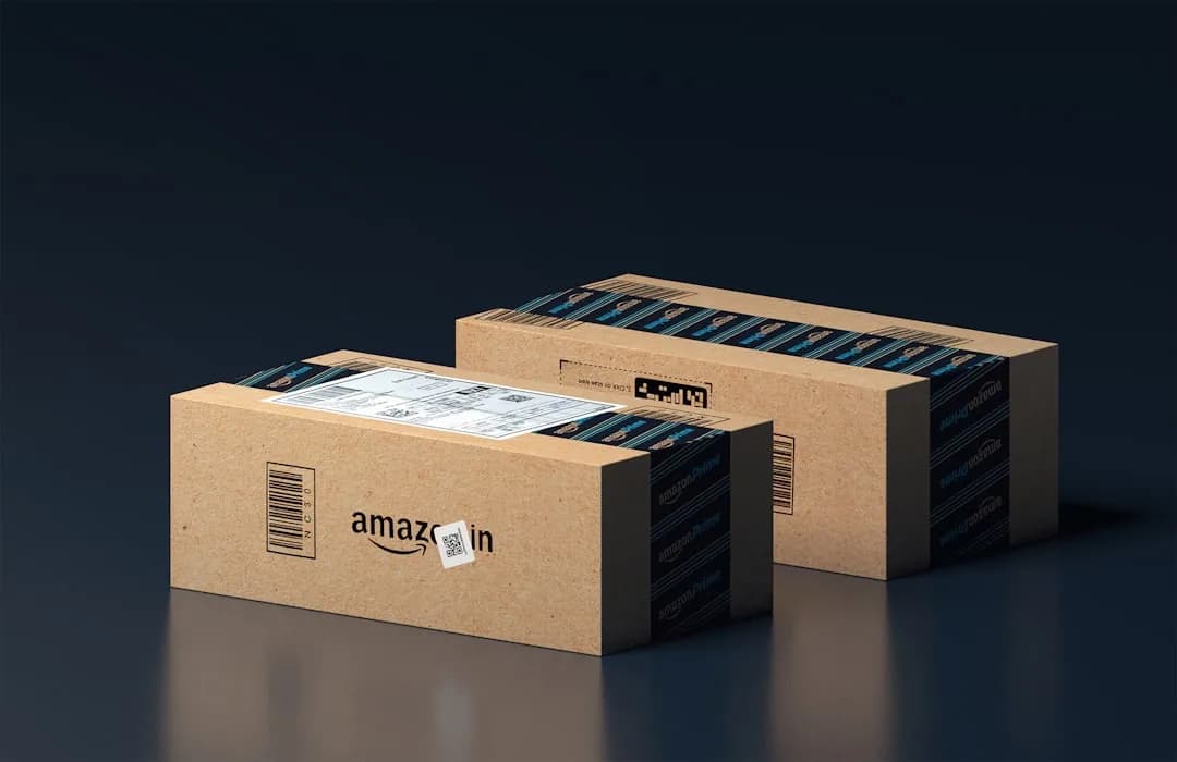 An Amazon FBA seller reviewing VAT figures and stock costs on a laptop at a desk