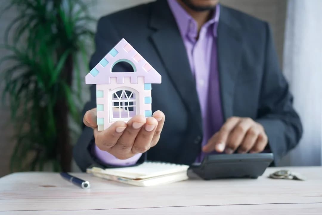 UK landlord reviewing rental property sale figures to work out a Capital Gains Tax bill
