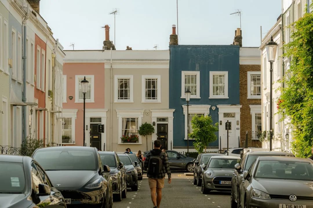 UK landlord reviewing property sale figures at a desk to plan capital gains tax