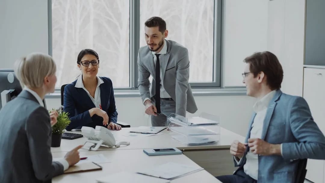 Limited company director at a desk comparing salary and dividend options for 2025/26
