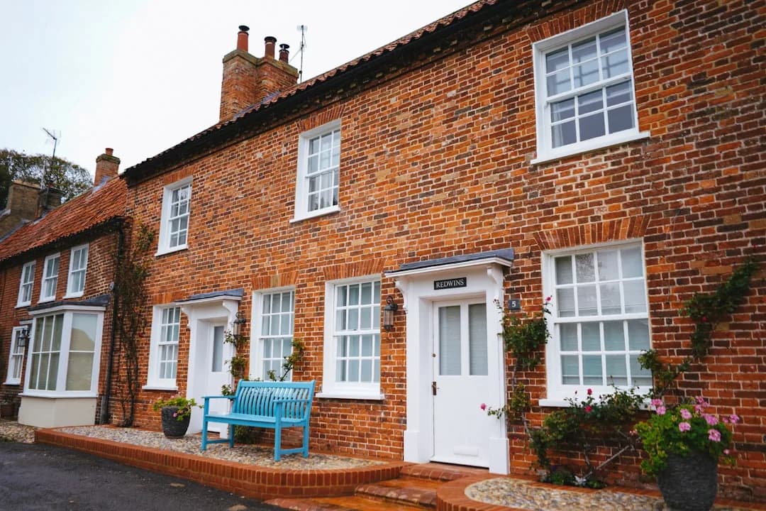 A UK landlord checking rental statements against tax figures to test the Making Tax Digital threshold
