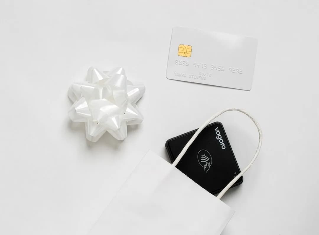 A UK Shopify seller reviewing gift card sales and a deferred revenue ledger on a laptop