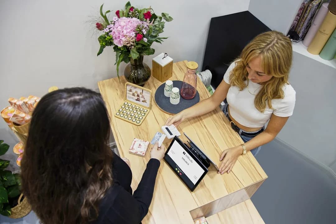 UK shop owner reconciling Shopify POS till takings with online sales for a VAT return