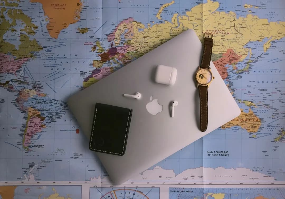 A UK Shopify seller at a laptop reviewing US state sales tax obligations for online orders