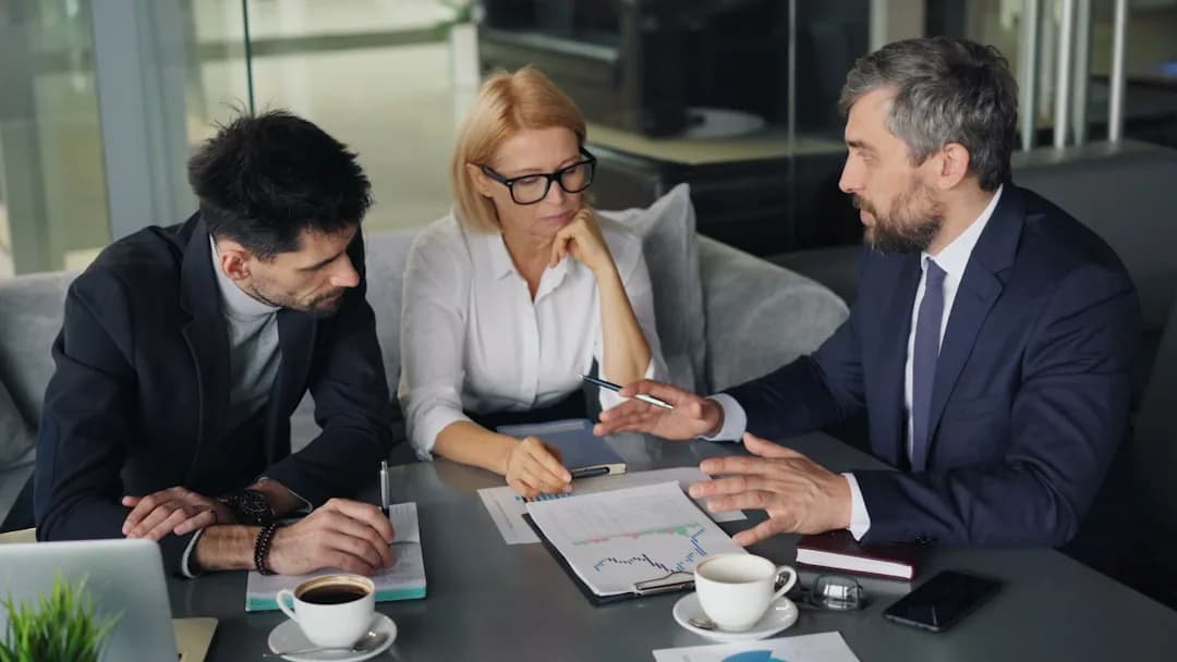 Founder reviewing a three-way financial forecast for a business plan
