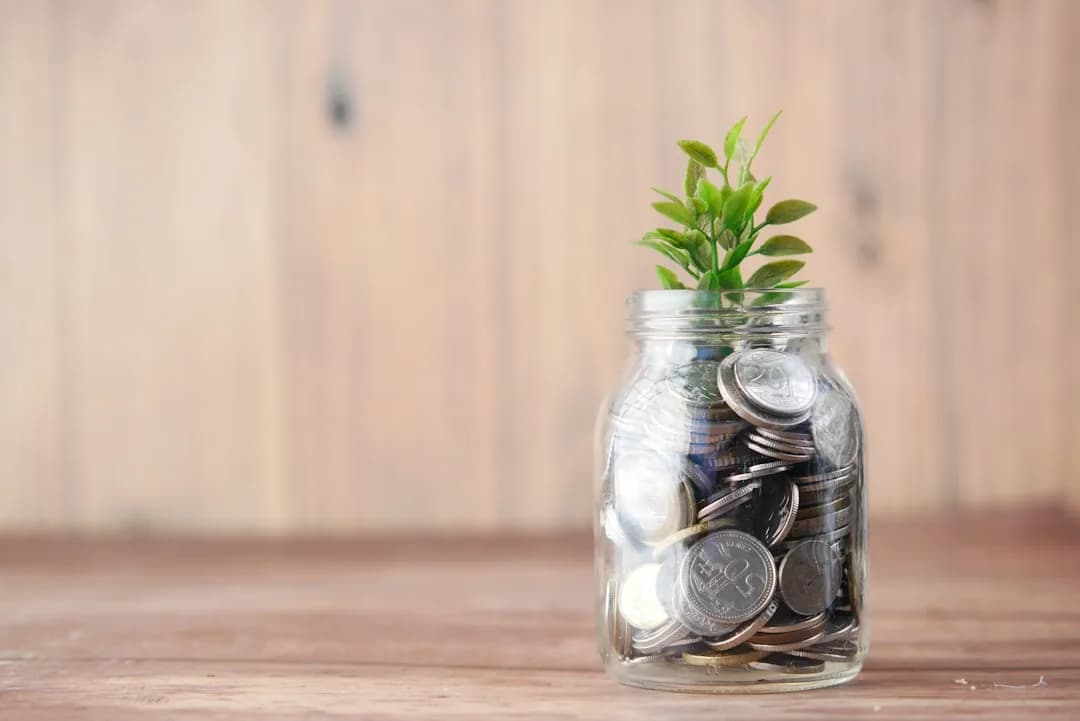 A saver at a kitchen table reviewing bank statements to check tax-free savings interest