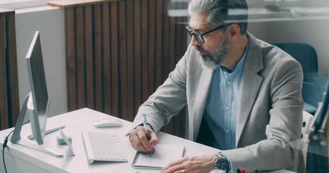 An ecommerce owner reconciling a WooCommerce order report against a Stripe payout on a laptop