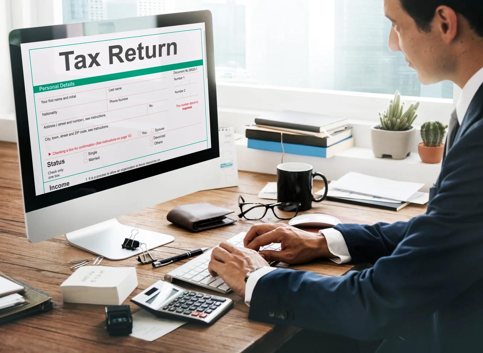 A computer screen showing tax return details, key for accounting compliance.