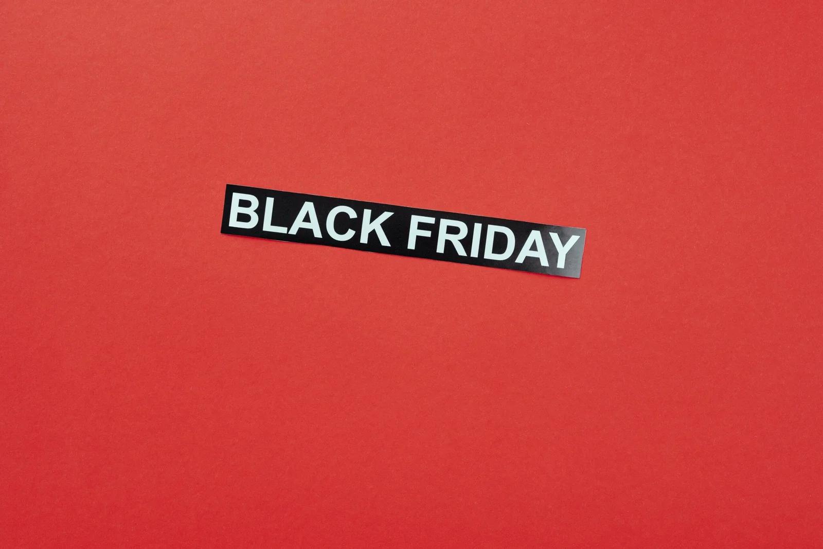 A "Black Friday" sale sign on a red background.