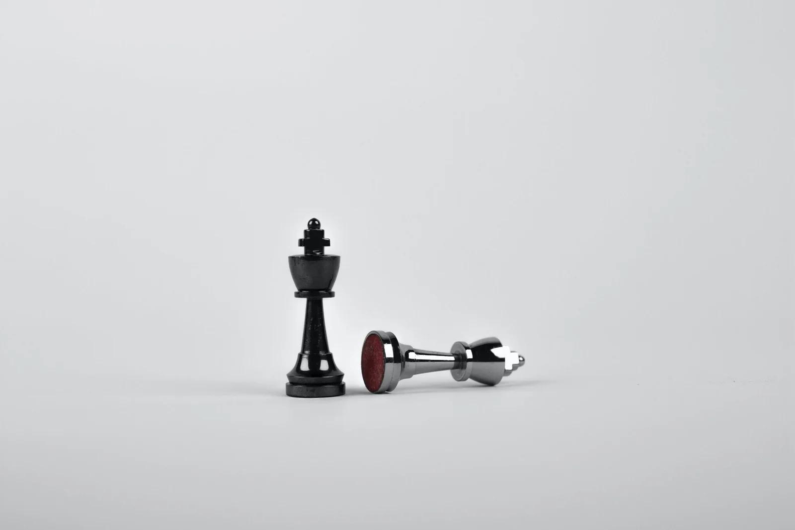 Chess pieces on a chessboard in a strategic position.