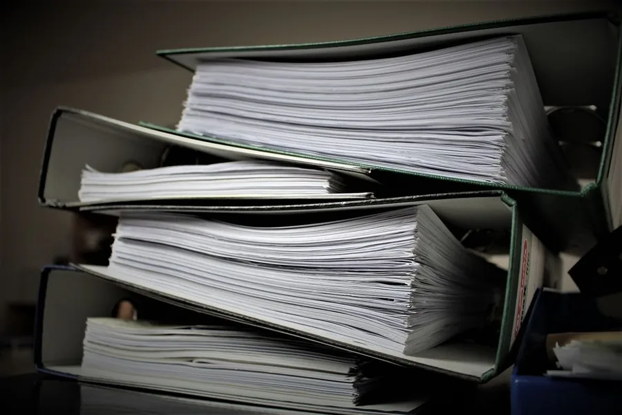 Lever arch files packed with a landlord's rental income and expense records, the paperwork an accountant digitises for Making Tax Digital Lever arch files packed with a landlord's rental income and expense records, the paperwork an accountant digitises for Making Tax Digital