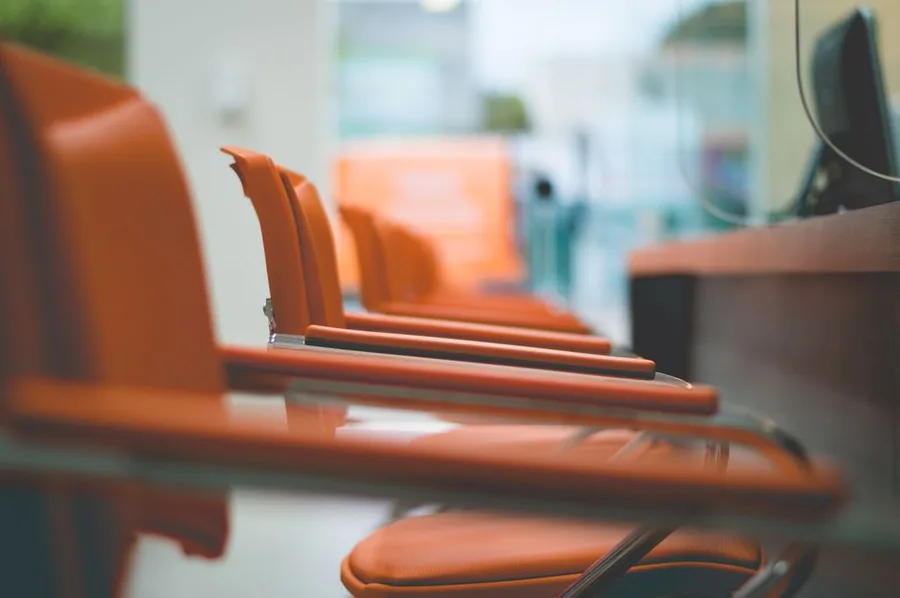Styling chairs lined up in a salon, the kind self-employed stylists rent under a chair rent arrangement