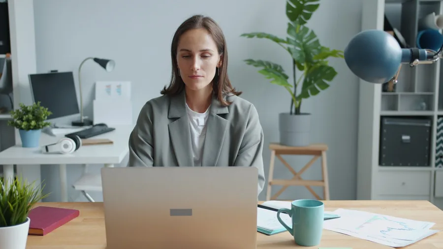 A company director working through year-end admin at a laptop, the kind of record-keeping the new SA102 close company boxes now call for A company director working through year-end admin at a laptop, the kind of record-keeping the new SA102 close company boxes now call for