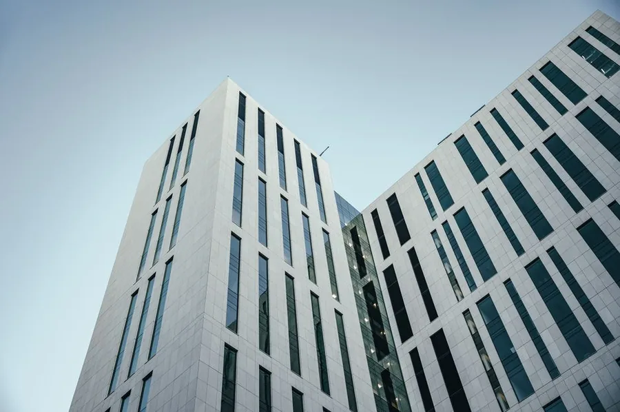 A modern corporate office building, the type of limited company that pays UK corporation tax on its profits