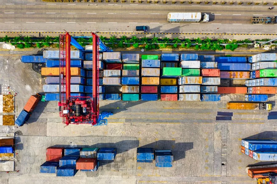 Aerial view of a container terminal where imported goods are cleared through customs before onward delivery Aerial view of a container terminal where imported goods are cleared through customs before onward delivery