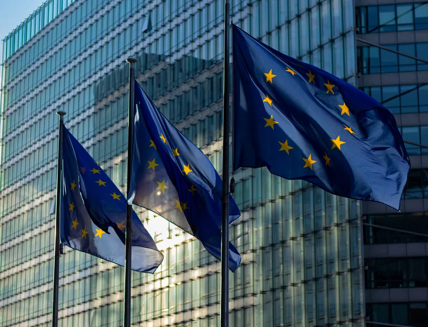 EU flags outside the European Commission building, evoking the VAT rules UK Amazon sellers face after Brexit EU flags outside the European Commission building, evoking the VAT rules UK Amazon sellers face after Brexit