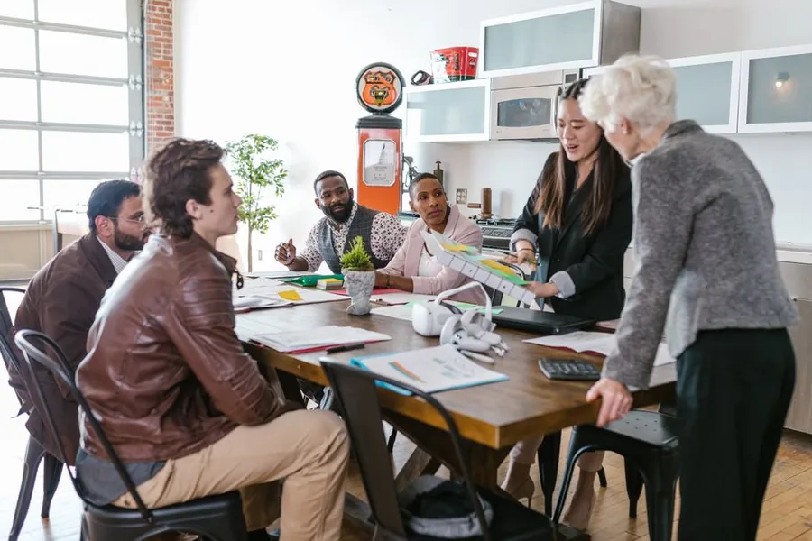 A founder and their fractional CFO reviewing financial forecasts and cash flow charts ahead of an investor fundraising round A founder and their fractional CFO reviewing financial forecasts and cash flow charts ahead of an investor fundraising round
