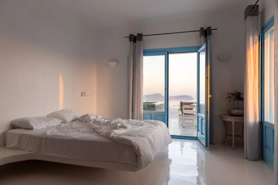 A furnished coastal holiday let bedroom with sea views, the type of property qualifying for allowable expense claims A furnished coastal holiday let bedroom with sea views, the type of property qualifying for allowable expense claims