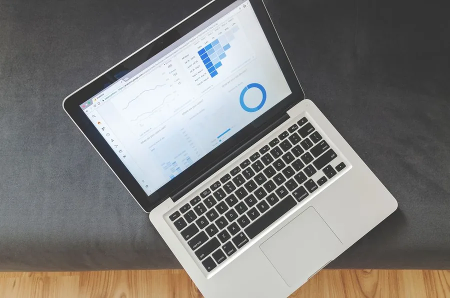 A laptop displaying financial dashboards and performance charts, the kind of digital tool UK businesses use to track their numbers
