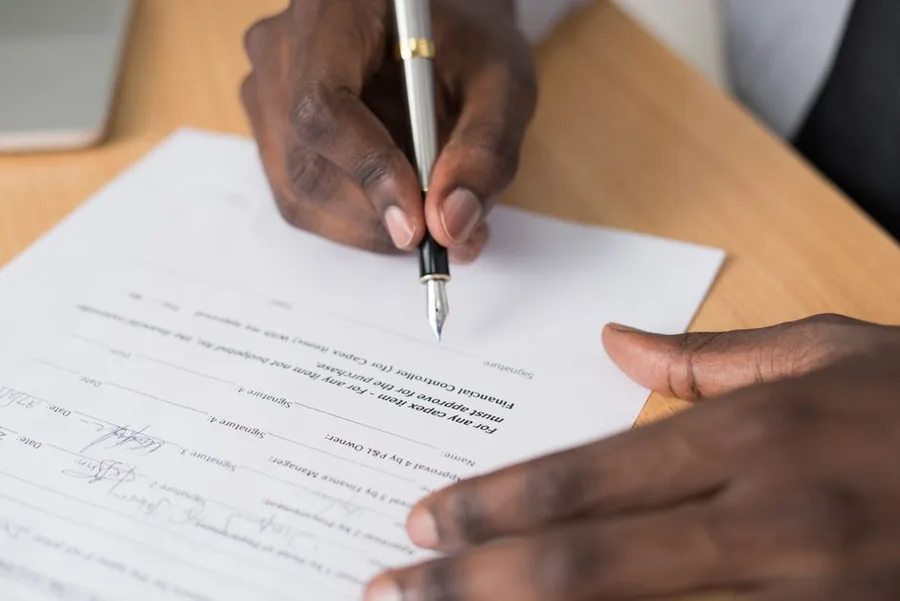 Signing off company paperwork by hand before submitting a DS01 strike-off application to Companies House