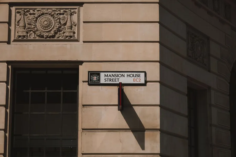 The Mansion House Street sign in the City of London, the district where many UK holding companies register their office The Mansion House Street sign in the City of London, the district where many UK holding companies register their office