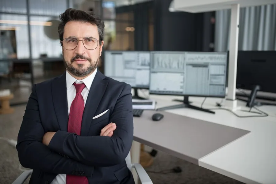 A UK company director in his office weighing up the right salary and dividend mix for the 2025/26 tax year A UK company director in his office weighing up the right salary and dividend mix for the 2025/26 tax year