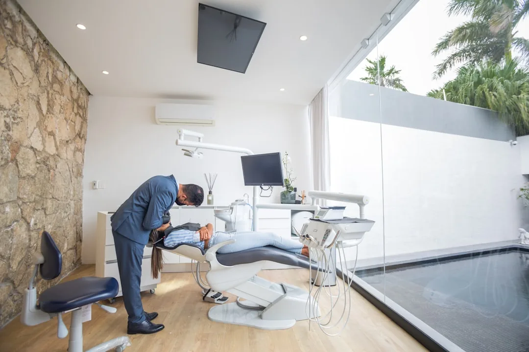 An associate dentist reviewing a self assessment tax bill and payment dates on a laptop