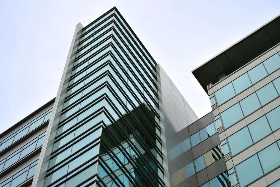 Glass-fronted office tower housing incorporated businesses, the kind of premises a UK private limited company might operate from