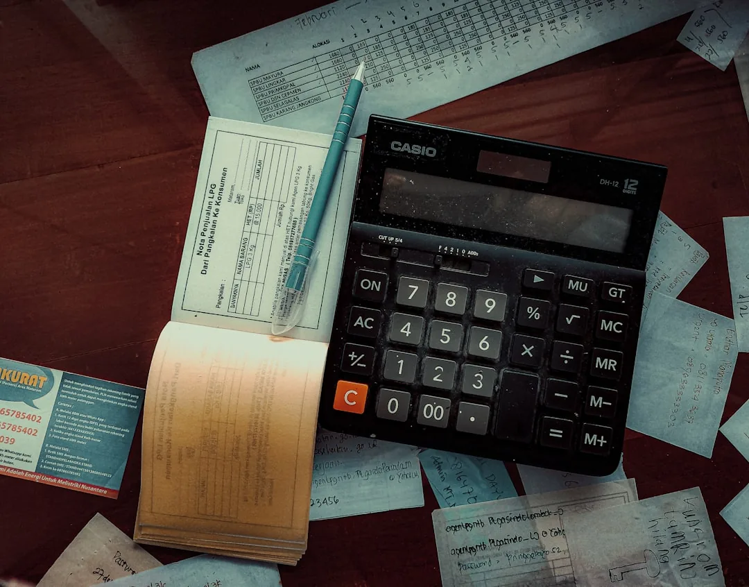 Self-employed person reviewing SA302 tax calculation documents for a mortgage application