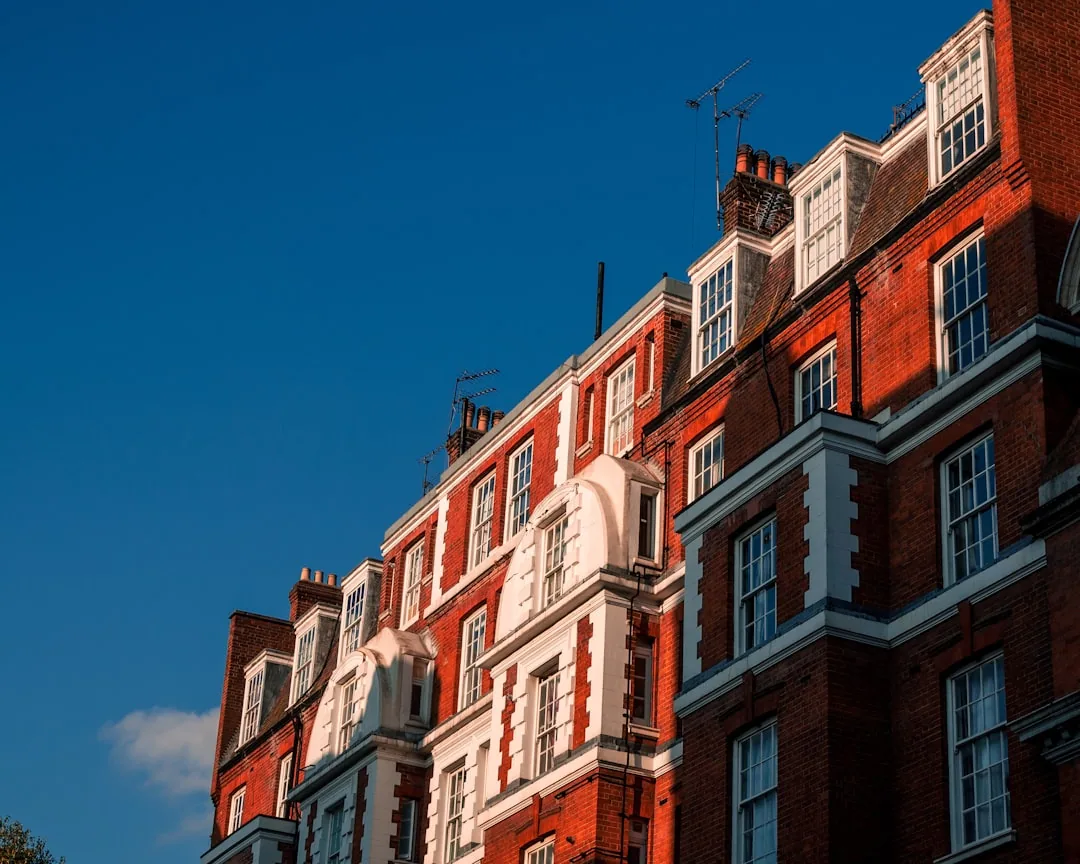 A UK landlord reviewing a tenancy agreement at a desk after the Renters' Rights Act
