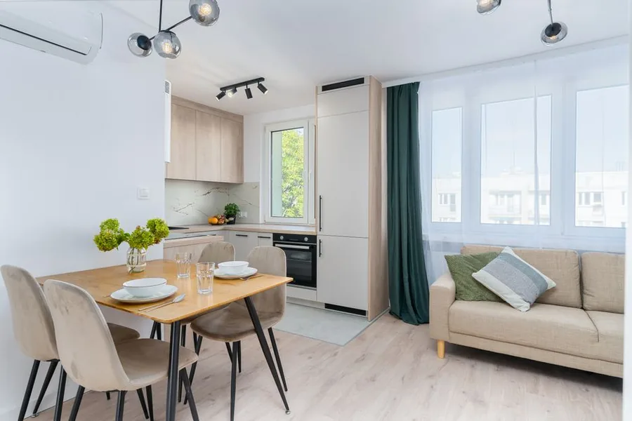 A furnished UK rental flat with a sofa, dining set and kitchen appliances, the kind of domestic items landlords can claim relief on when replaced A furnished UK rental flat with a sofa, dining set and kitchen appliances, the kind of domestic items landlords can claim relief on when replaced