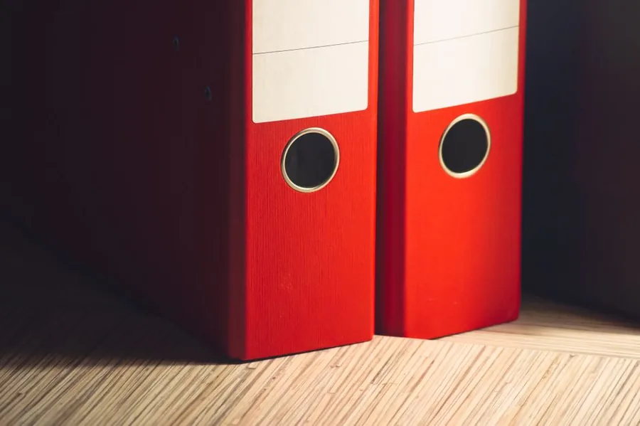Red lever-arch files holding the paperwork you gather to sort out an HMRC Self Assessment late filing penalty Red lever-arch files holding the paperwork you gather to sort out an HMRC Self Assessment late filing penalty