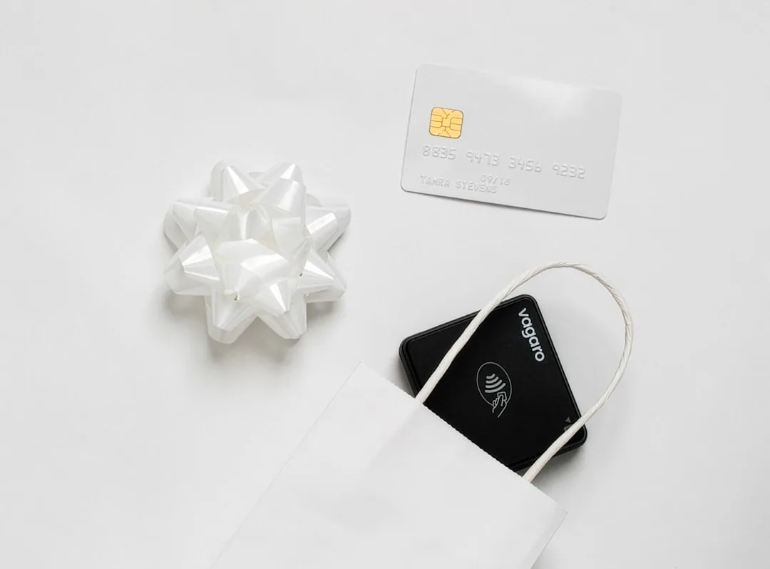 A UK Shopify seller reviewing gift card sales and a deferred revenue ledger on a laptop
