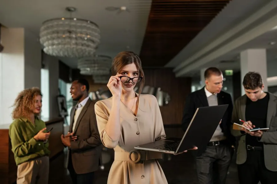 A self-employed worker reviewing business expenses on a laptop from her home office A self-employed worker reviewing business expenses on a laptop from her home office