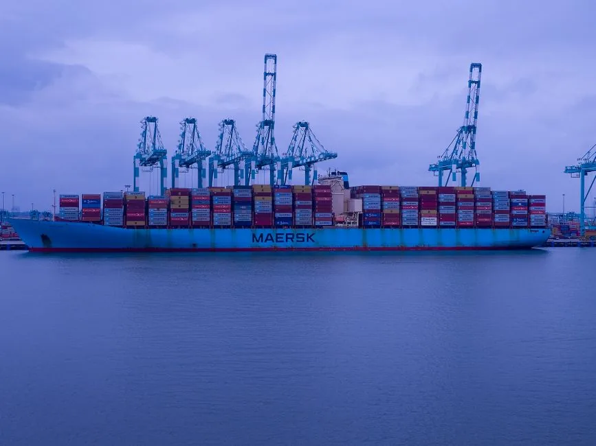 A container ship laden with imported goods docked at port beneath loading cranes, where UK customs duty is assessed A container ship laden with imported goods docked at port beneath loading cranes, where UK customs duty is assessed