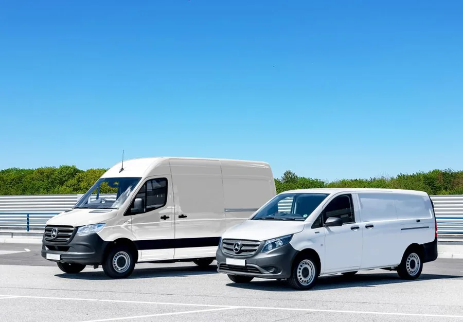 Two commercial panel vans parked on a forecourt, the kind of vehicle a self-employed sole trader claims against tax Two commercial panel vans parked on a forecourt, the kind of vehicle a self-employed sole trader claims against tax