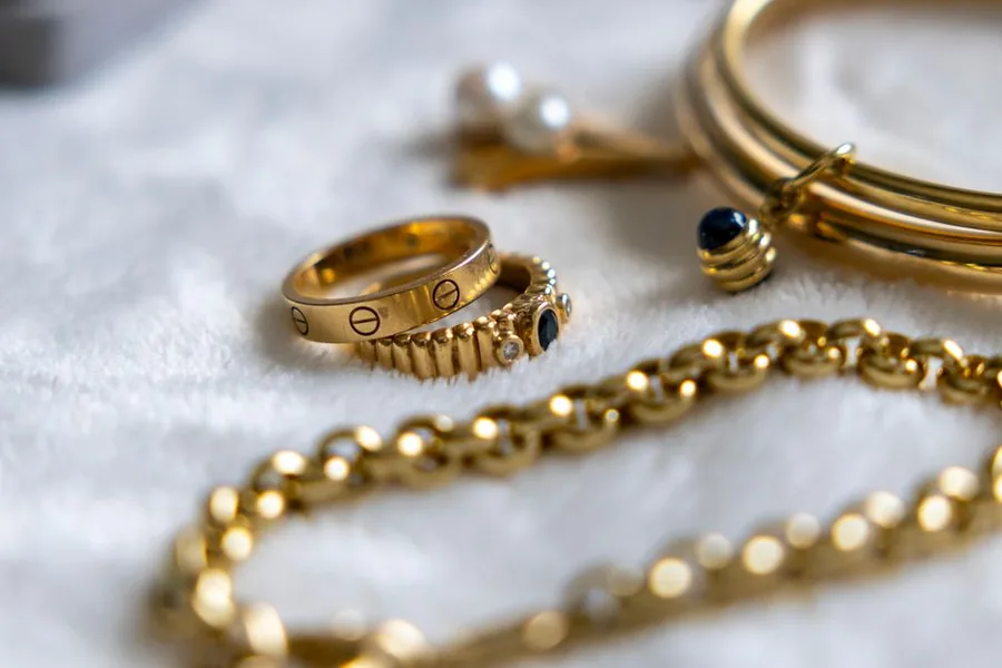 Assorted gold rings, chains and bangles, the kind of pieces where UK VAT treatment on second-hand and new gold differs Assorted gold rings, chains and bangles, the kind of pieces where UK VAT treatment on second-hand and new gold differs