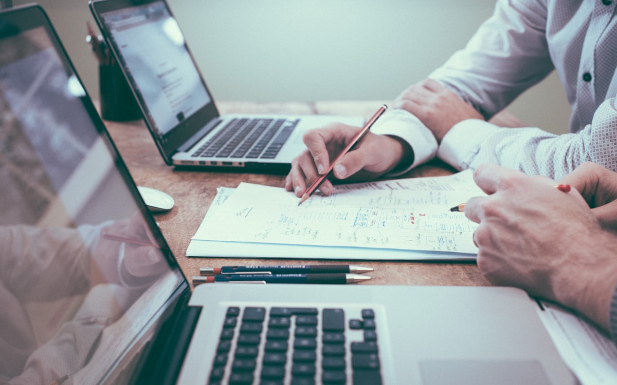 Reviewing financial reports at a desk