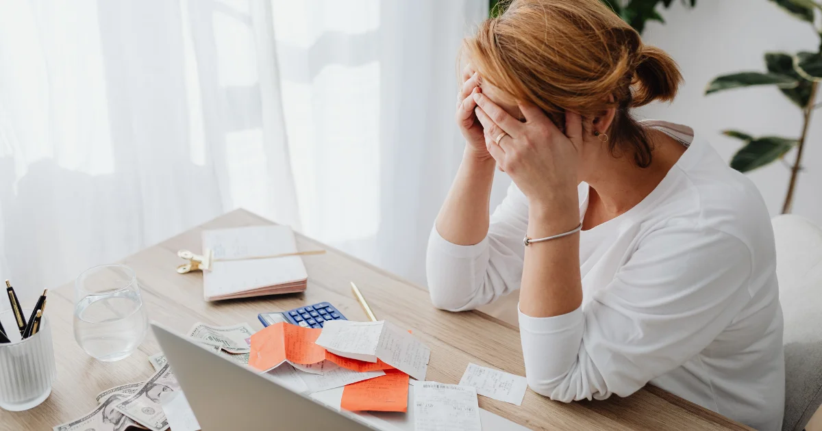 Small business owner reviewing allowable expenses for tax savings.