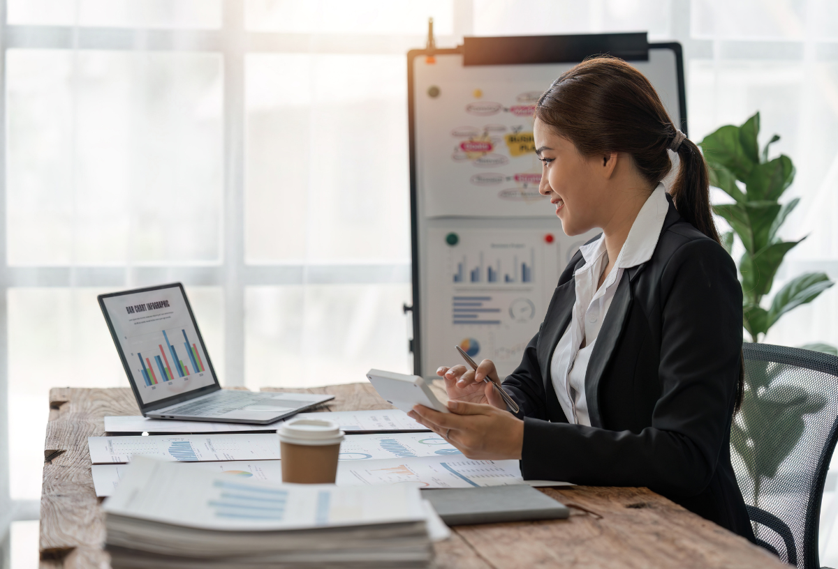 Female business consultant analyzing financial charts in a meeting